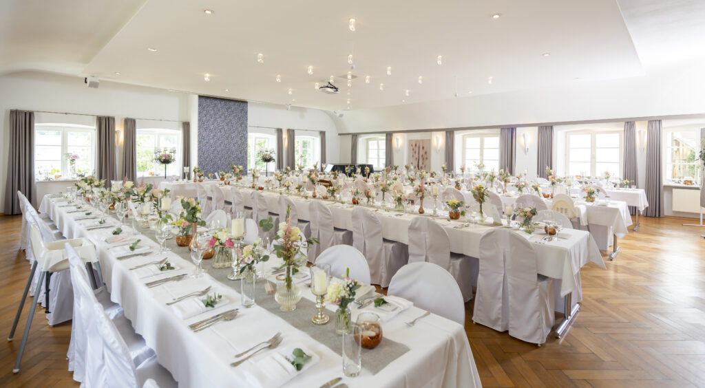 Wide shot of a room prepared for a wedding